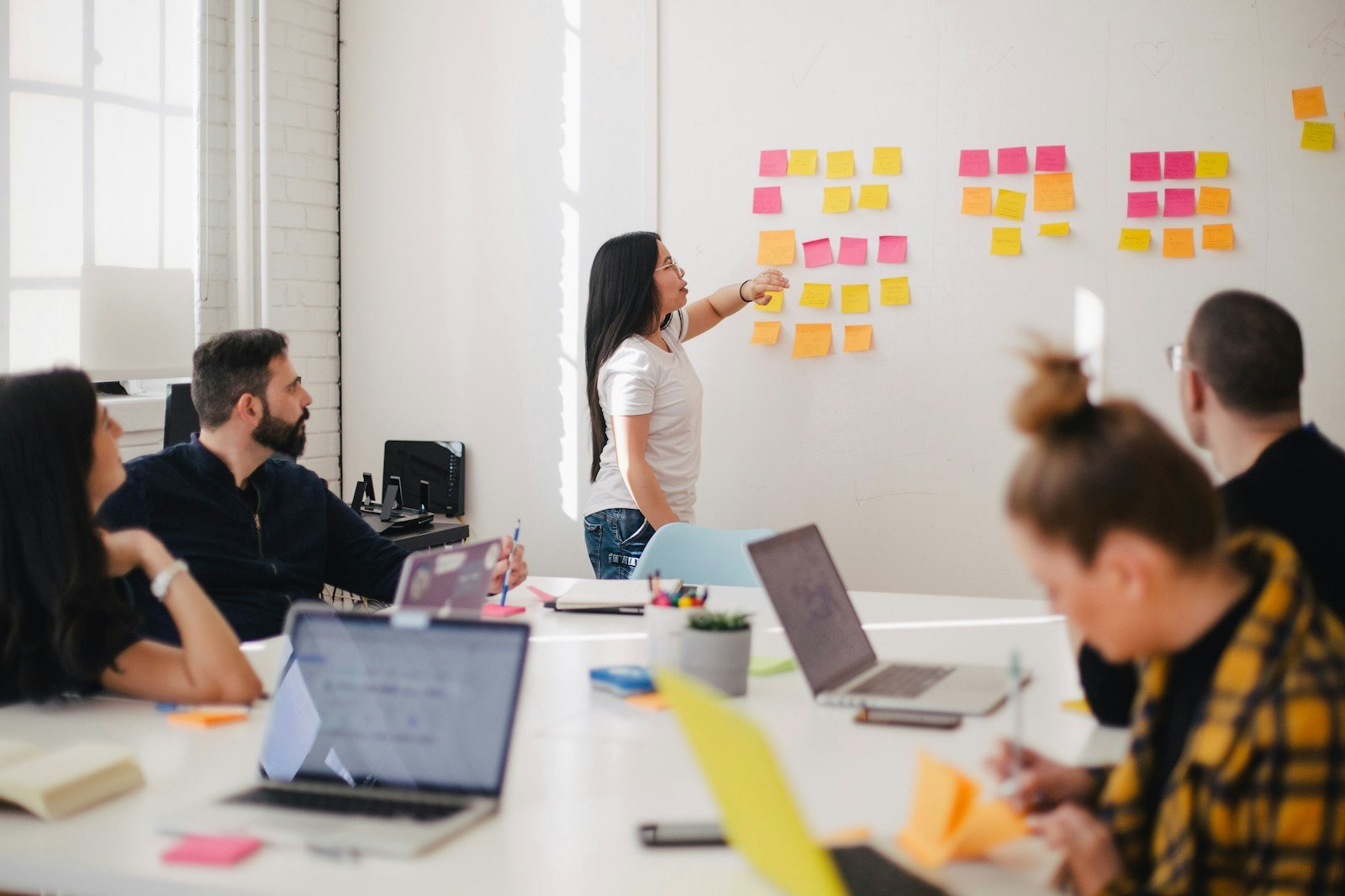 Designers and developers reviewing a product together